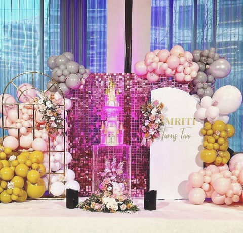 Corporate balloon arch in black, white and gold