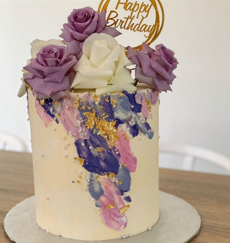 Birthday cake with fresh flowers