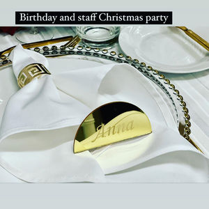 gold serviette ring / white napkin