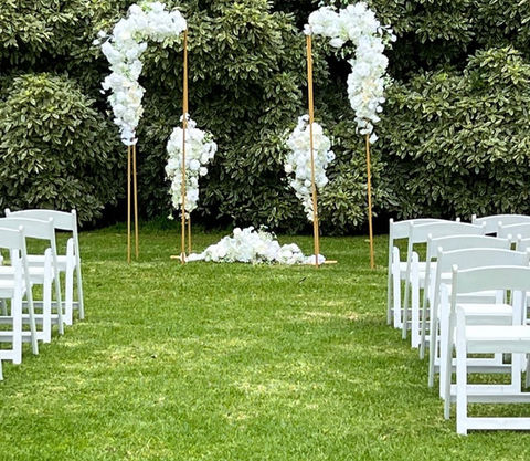 Gold and white ceremony plinths