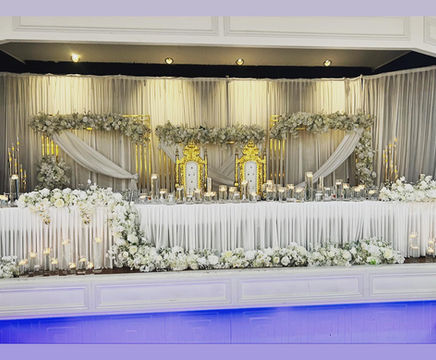 candles and waterfall of flowers backdrop
